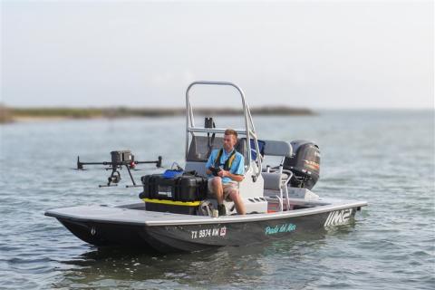 Drone pilot assessing water bird mortality event in Corpus Christi Bay