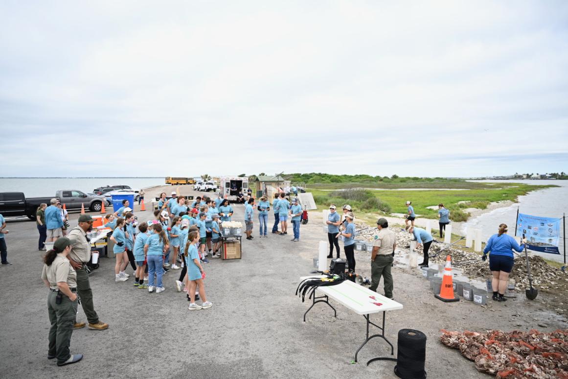 Students take part in a Sink Your Shucks event on Wednesday, May 7 at Goose Island State Park.